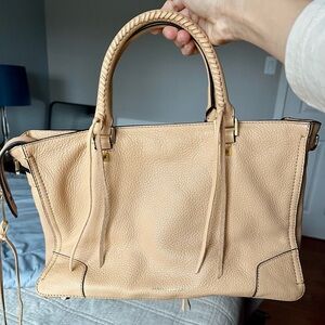 Rebecca Minkoff tan leather tote bag with fringe.